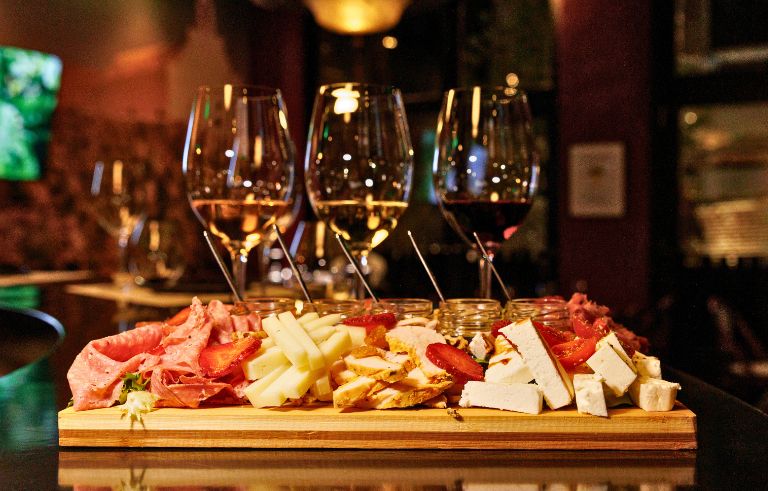 Home Wine and deli pairing in Athens with Greek wines cheeses and charcuterie at Cinque Wine & Deli